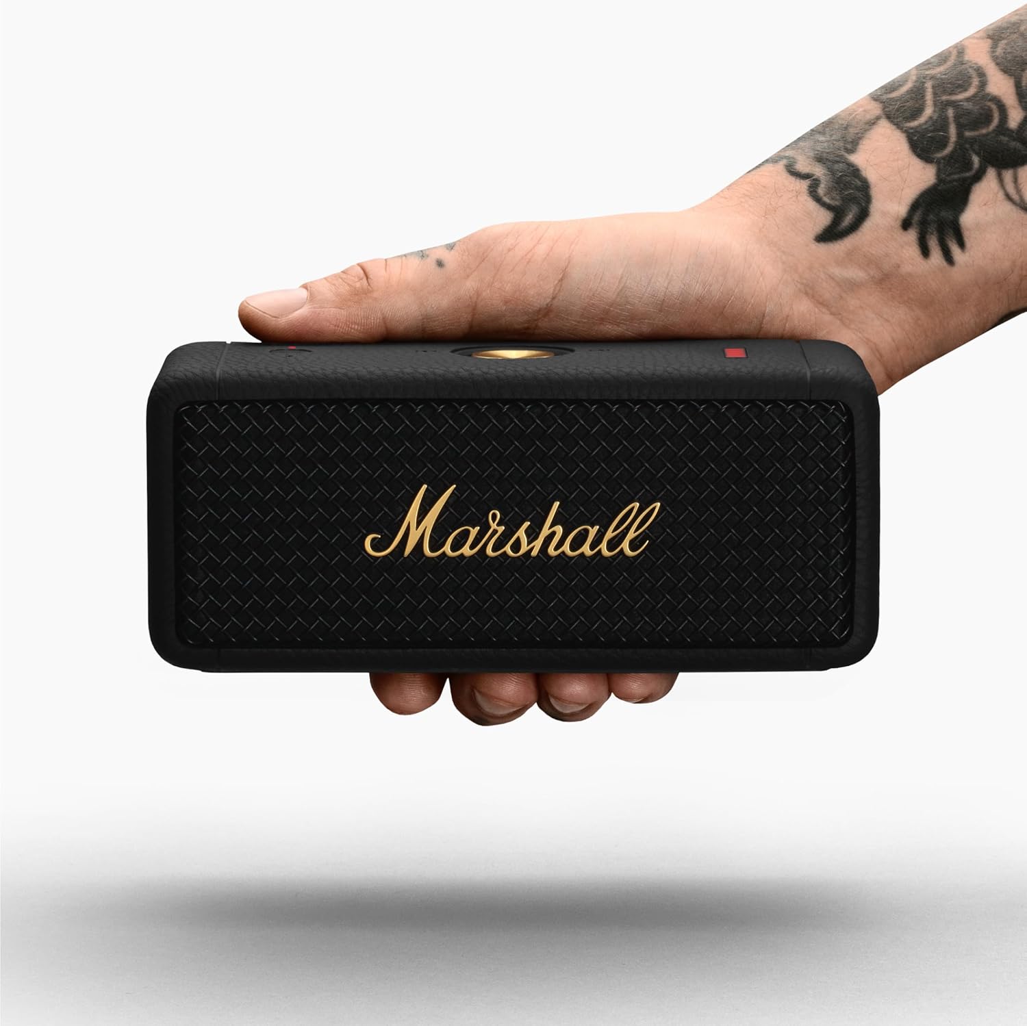 Altavoz Marshall de estilo vintage con diseño de amplificador de guitarra.